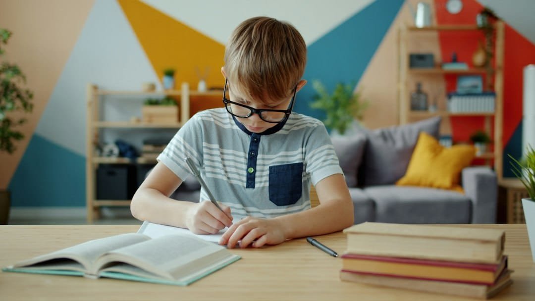 Student studying at home with books and learning support