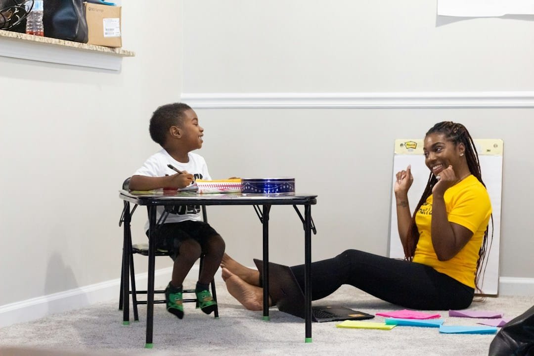 A tutor working one-to-one with a student
